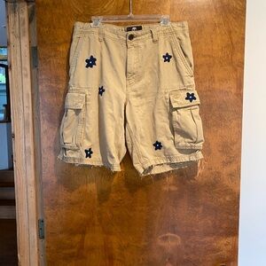 Embellished Tan Cargo Shorts with Blue Star Accents